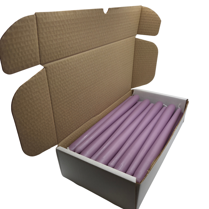 Box of 36 Lilac taper candles with white background