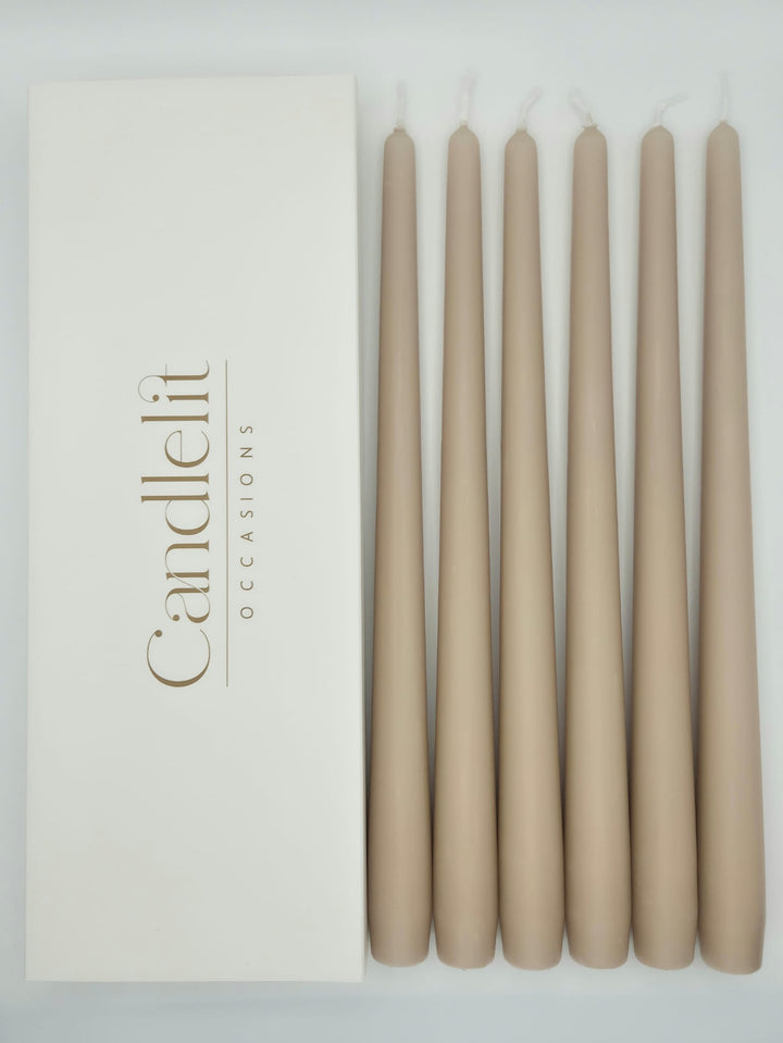 Natural nude taper candles styled for luxury wedding tablescape